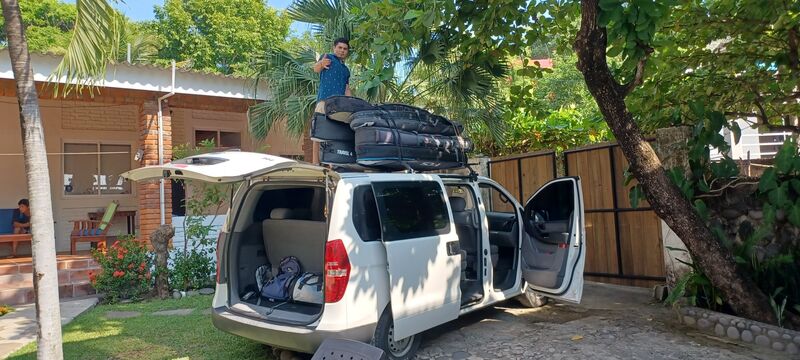 Loading surfboards onto K59 transport van
